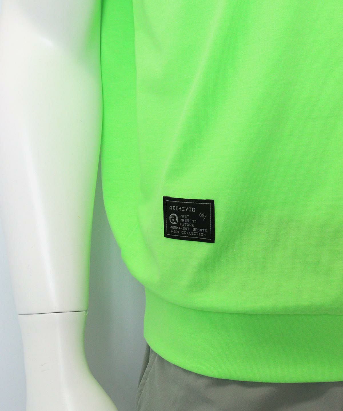 裾ロゴタグ部分（ライトグリーン）