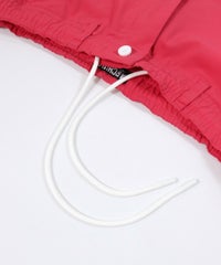 調節紐部分（ピンク）