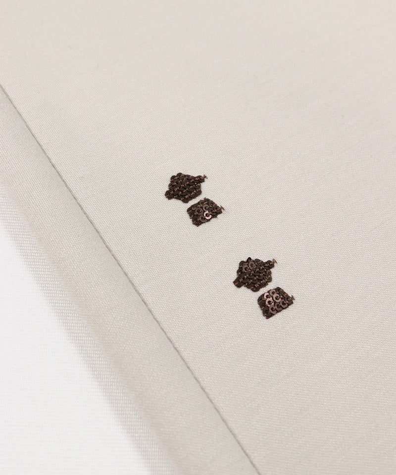 デザイン部分（ベージュ）