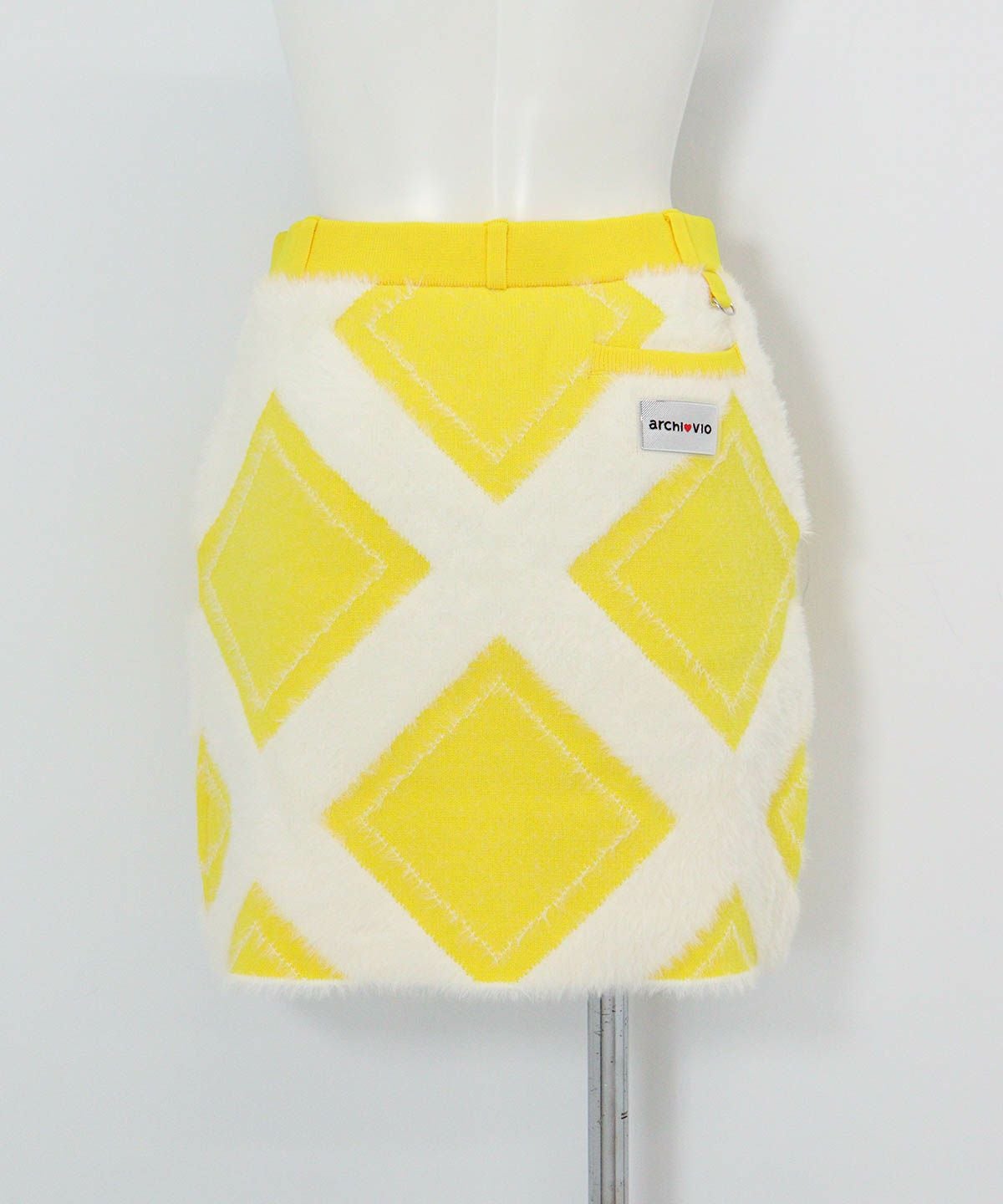 フェザーヤーン保温ニットスカート後（ライトイエロー）