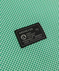 ロゴタグ部分（グリーン）