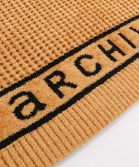 ロゴデザイン部分（キャメル）