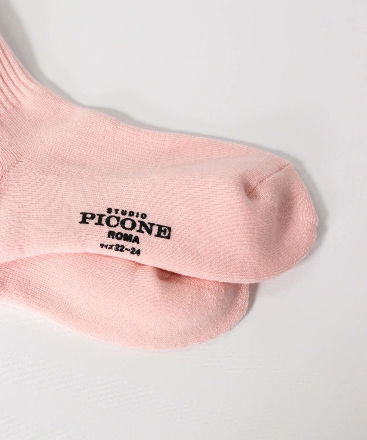 ロゴプリント部分（ピンク）