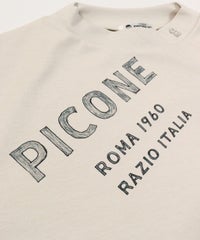 ロゴデザイン部分（ベージュ）