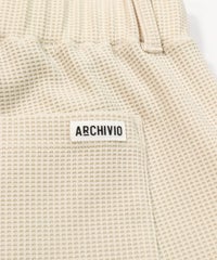 ロゴ部分（ベージュ）