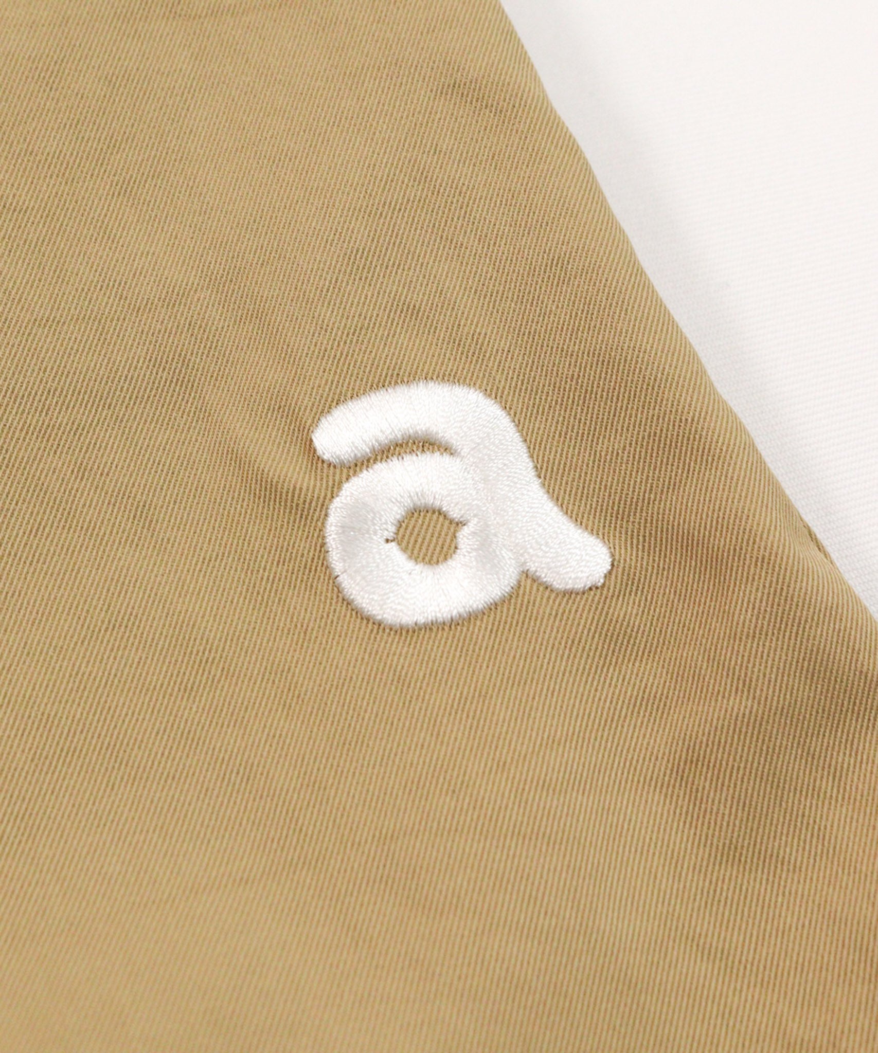 デザイン部分（ベージュ）