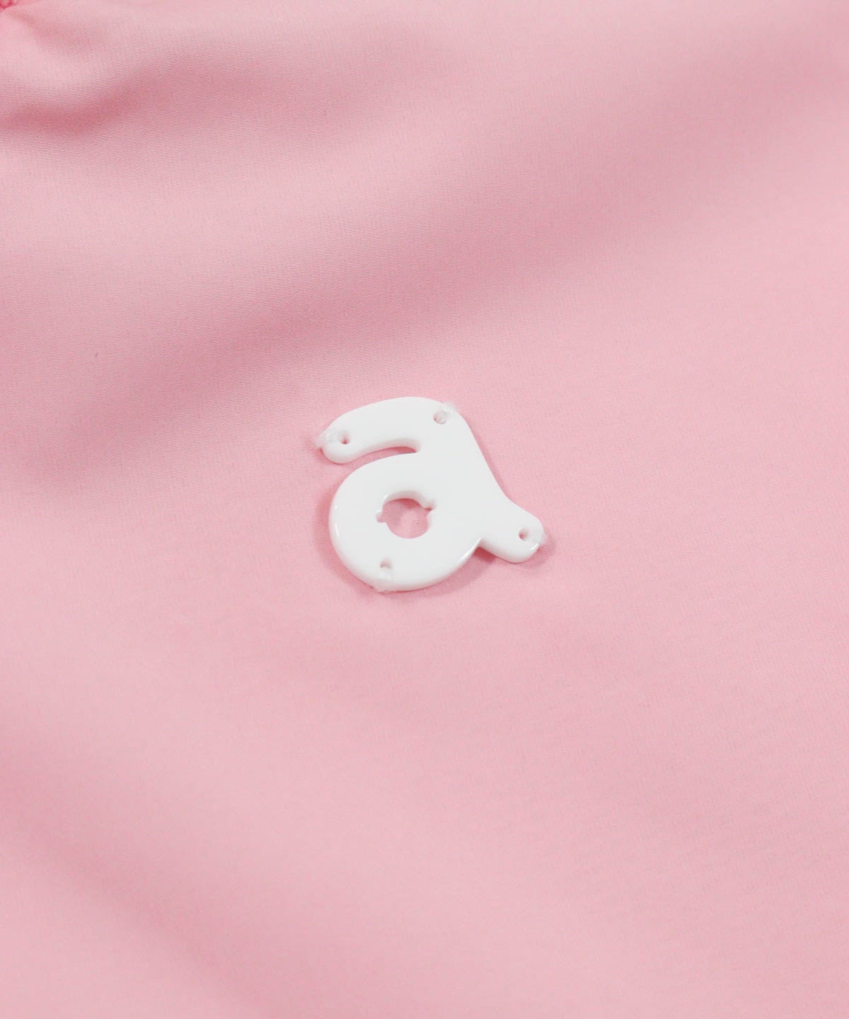 ロゴデザイン部分（ピンク）