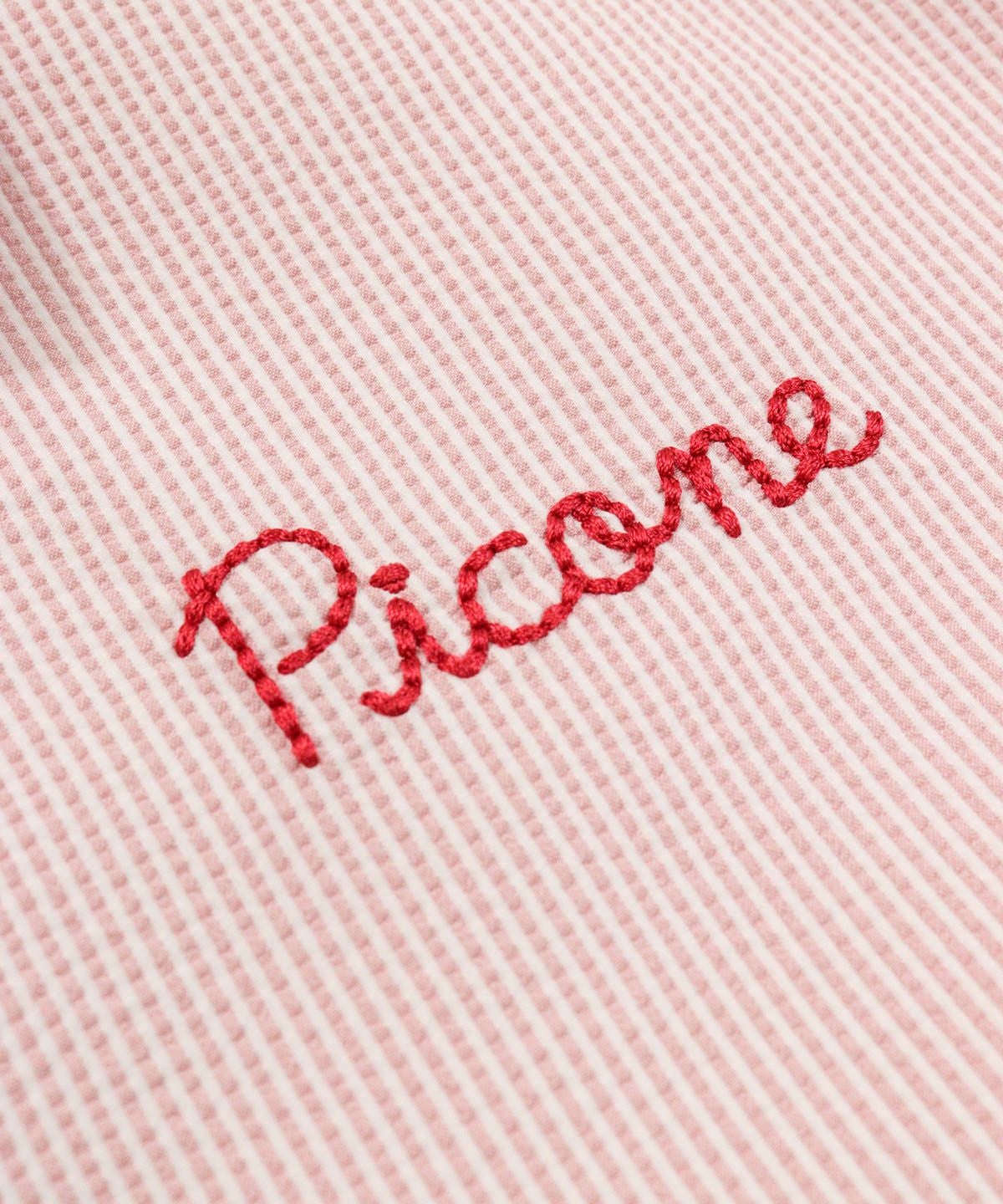 ロゴデザイン部分（ピンク）