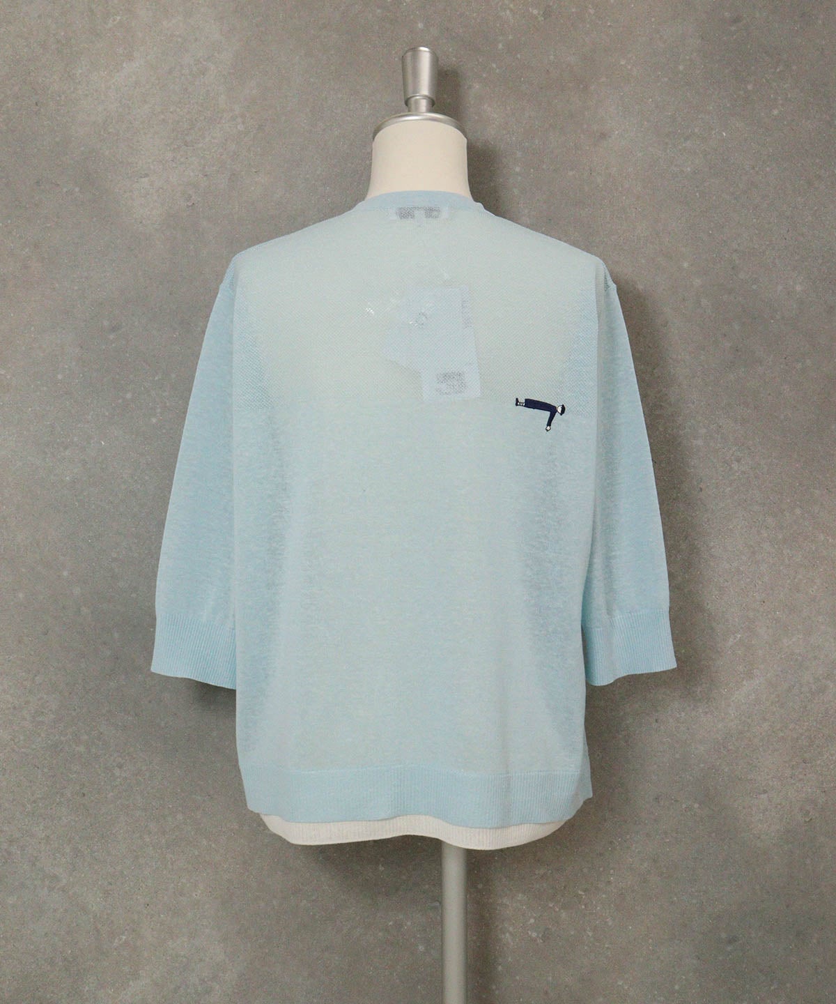 編地切替ニットカーディガン(ライトブルー)後ろ