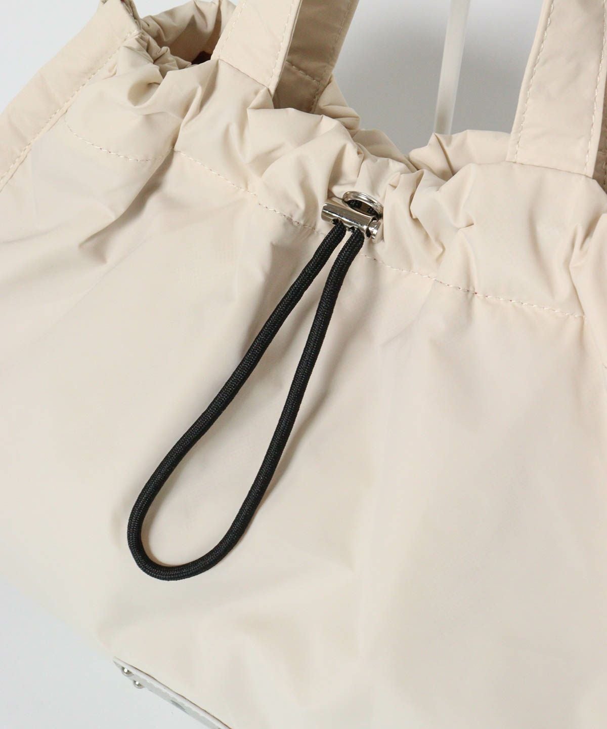 調節紐部分（ベージュ）